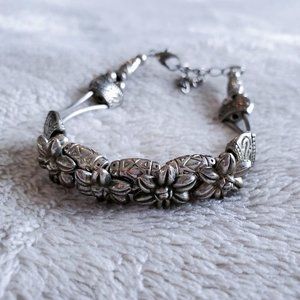 monochrome Eastern Asian tribal silver floral bracelet